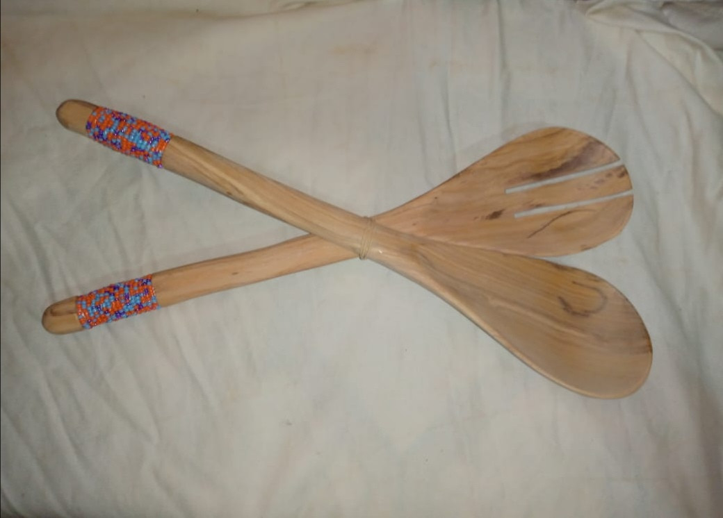 Decorated wooden salad spoon
