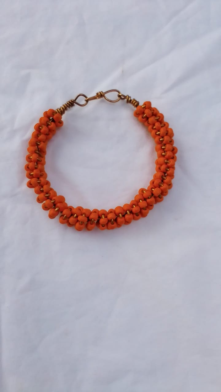 Orange Spiral Beads and Brass Bracelet