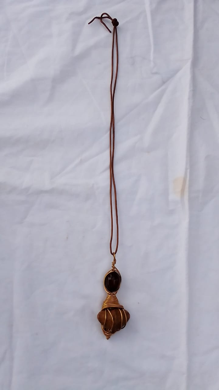 Seed And Black Stone Brass Pendant